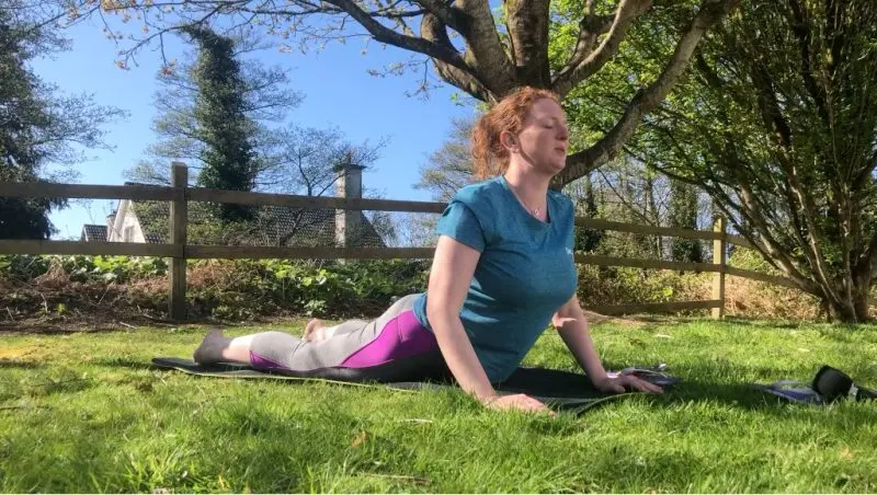 Aisling Battersby doing a Sun Salutation yoga routine. Video thumbnail.