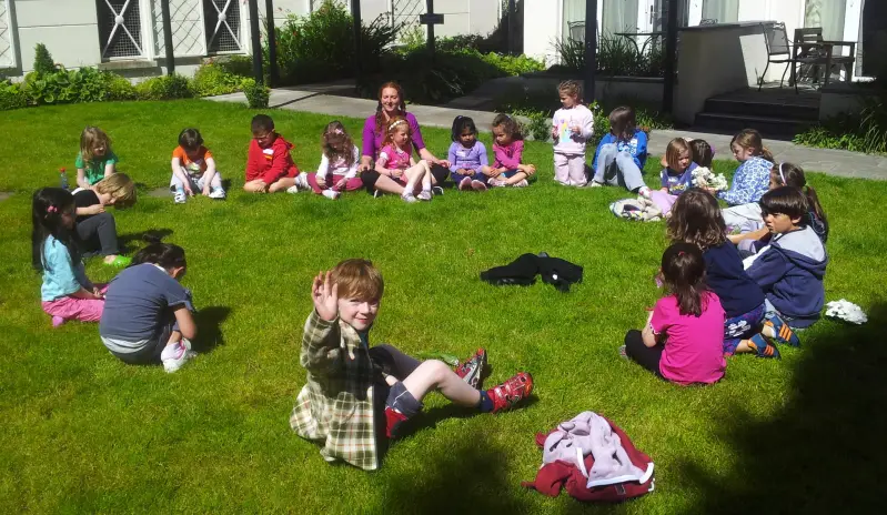 Aisling with happy kids at yoga camp